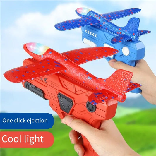 Catapult Foam Plane Gun Fire Outdoor Sports Hand Toss Flying Glider Toy Boys GGirls